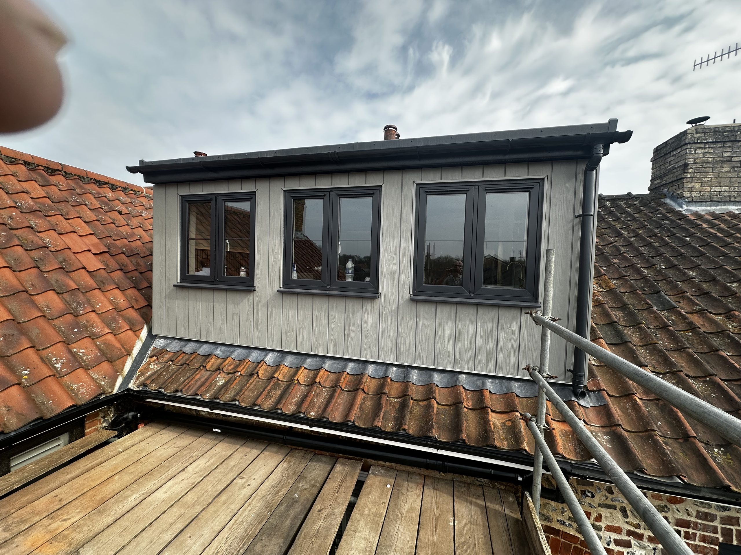 Completed dormer with windows set into a tiled roof, Bury St Edmunds loft conversion